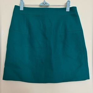 J Crew bright green wool mini skirt, size 2, lined.